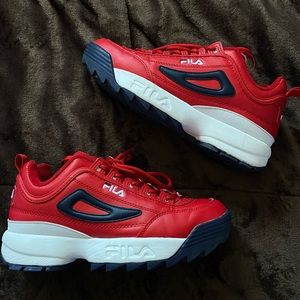 Worn once Fila shoes, practically new. Shoe laces in tacked